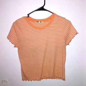 Orange and white striped top